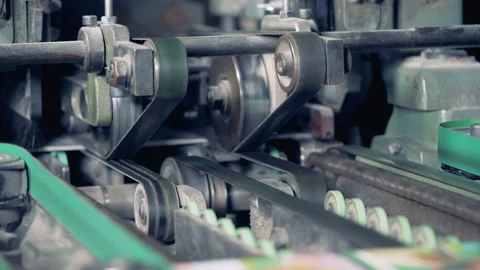 The circulation of the newspaper on a typography conveyor. 4K. Stock Footage 86170325