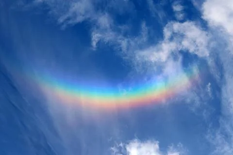 Circumzenithal arc visible as a upside down rainbow Stock Photos
