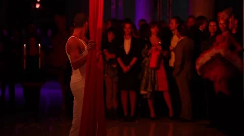 Circus acrobat performs on a pink ribbon Stock Footage 62196311