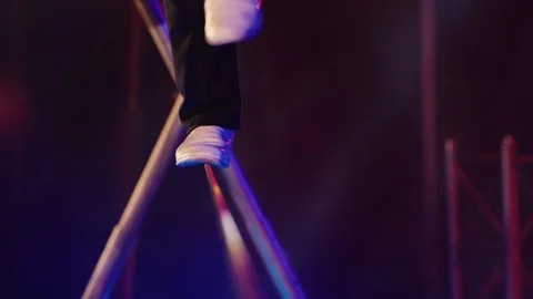 Circus acrobat walks on a rope Stock Footage