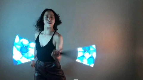 Circus Performer Dancer Spinning LED Visual Staff Light Sticks Video stock 128088147