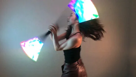 Circus Performer Dancer Spinning LED Visual Staff Light Sticks Video stock 128088392