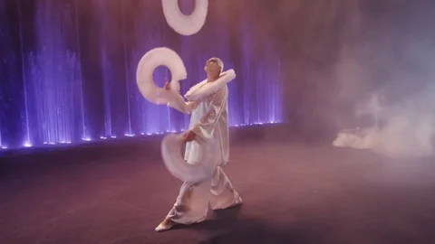 Circus performer juggling with three big white rings, Moscow, Russia Stock Footage 72608793