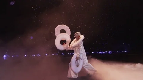 Circus performer juggling with three big white rings, Moscow, Russia Stock Footage 72608872