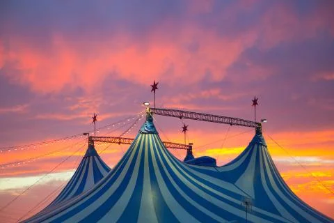 Circus tent in a dramatic sunset sky colorful Stock Photos