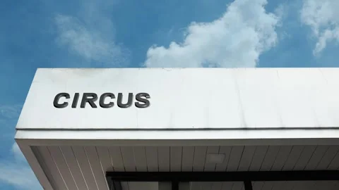 Circus word sign displayed on building with blue sky background Stock Footage 318565664