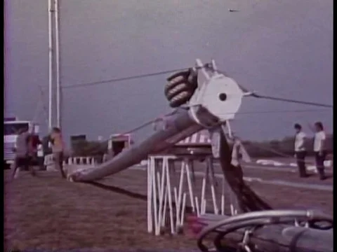 Circus workers raise the big tent in 1974, and a look at the big cats that Stock Footage 74888513