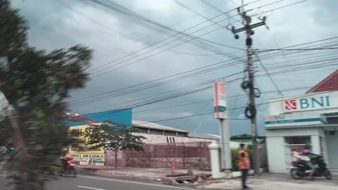 CIREBON, JAVA, INDONESIA - MARCH 5, 2026: car ride through busy City 스톡 동영상 337190240
