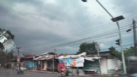 CIREBON, JAVA, INDONESIA - MARCH 5, 2026: car ride through busy City 스톡 동영상 337190268