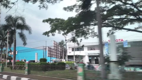 CIREBON, JAVA, INDONESIA - MARCH 5, 2026: car ride through busy City 스톡 동영상 337190336