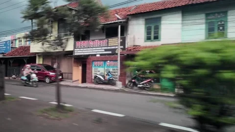 CIREBON, JAVA, INDONESIA - MARCH 5, 2026: car ride through busy City 스톡 동영상 337190359