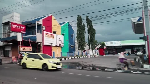 CIREBON, JAVA, INDONESIA - MARCH 5, 2026: car ride through busy City 스톡 동영상 337190365