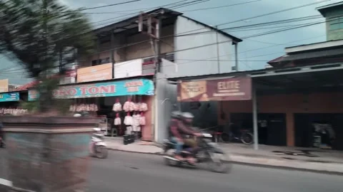 CIREBON, JAVA, INDONESIA - MARCH 5, 2026: car ride through busy City 스톡 동영상 337190377