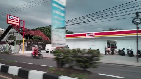 CIREBON, JAVA, INDONESIA - MARCH 5, 2026: car ride through busy City 스톡 동영상 337190408