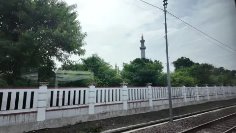 CIREBON, JAVA, INDONESIA - MARCH 6, 2026: Train ride through landscapes on .. Stock Footage 337190427