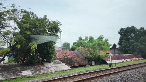 CIREBON, JAVA, INDONESIA - MARCH 6, 2026: Train ride through landscapes on .. 스톡 동영상 337190618
