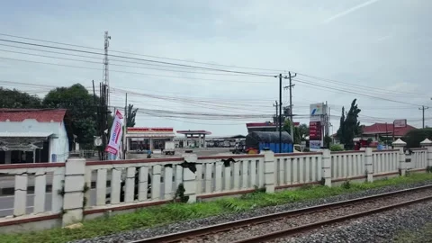 CIREBON, JAVA, INDONESIA - MARCH 6, 2026: Train ride through landscapes on .. 스톡 동영상 337190636