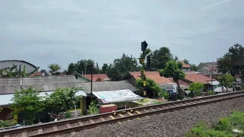 CIREBON, JAVA, INDONESIA - MARCH 6, 2026: Train ride through landscapes on .. 스톡 동영상 337190787