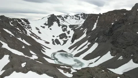 Cirque lake on a mountain - Aerials Stock Footage 161432001