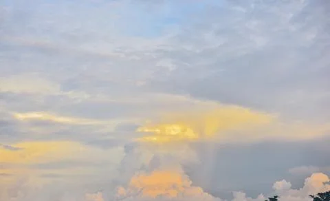 Cirrocumulus and cumulus cloud formations on a sunny afternoon in late summer Stock Photos