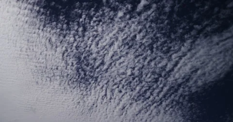 Cirrocumulus clouds in a big blue sky on a late-afternoon on a summer day. Stock Footage 339115522
