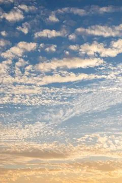 Cirrocumulus clouds sunset sky cloudscape background pattern Stock Photos