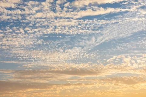Cirrocumulus clouds sunset sky cloudscape background pattern Stock Photos