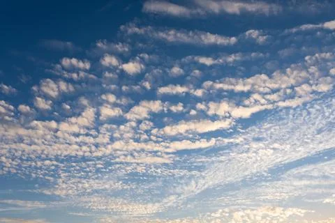 Cirrocumulus clouds sunset sky cloudscape background pattern Stockfoto's