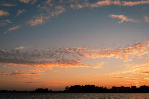 Cirrocumulus clouds sunset sky landscape Stock Photos