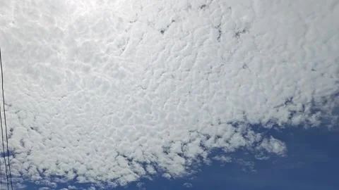 Cirrocumulus or altocumulus clouds texture in blue sky. Stock Footage 341958331