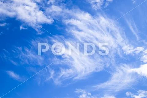 Cirrus and cumulus clouds. Heavenly landscape with clouds. Cumulus clouds in Stock Photos