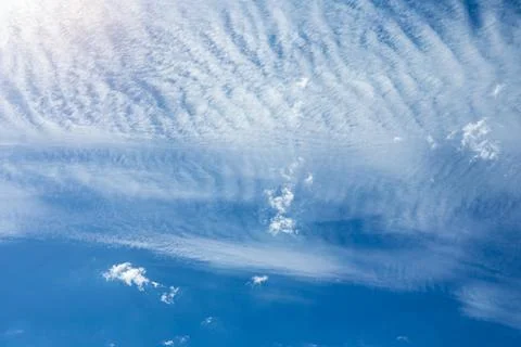 Cirrus and Stratus clouds in dramatic blue sky over Cape Town Stock Photos