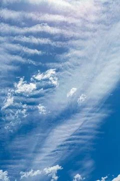 Cirrus and Stratus clouds in dramatic blue sky over Cape Town Cirrus and S... Stock Photos