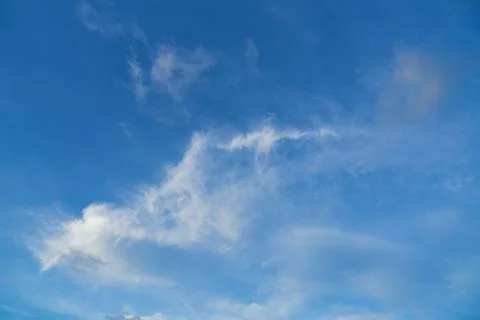 Cirrus clouds on blue sky background Stock Photos