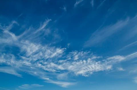 Cirrus clouds on blue sky Stock Photos