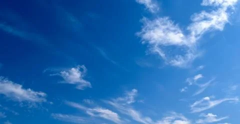 Cirrus clouds in blue sky Stock Photos