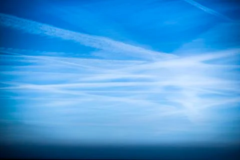 Cirrus clouds, blue sky summer time. Stock Photos