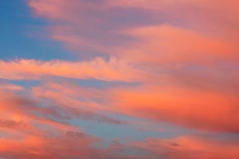 Cirrus clouds during sunset Stock Photos
