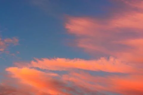 Cirrus clouds during sunset Stock Photos