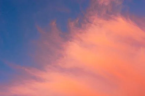Cirrus clouds during sunset Stock Photos