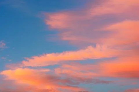 Cirrus clouds during sunset Stock Photos