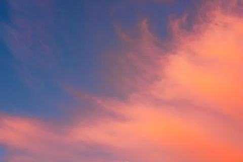 Cirrus clouds during sunset Stock Photos