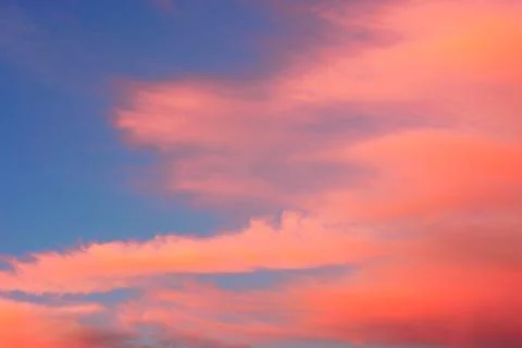 Cirrus clouds during sunset Stock Photos