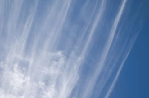 Cirrus clouds in the sky of Mogan. Stock Photos