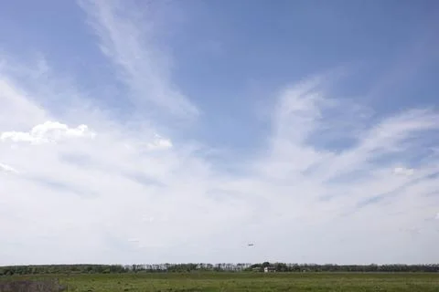 Cirrus clouds in the troposphere Stock Photos