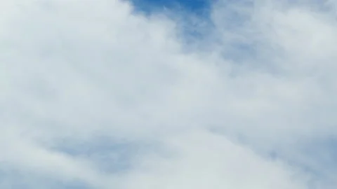 Cirrus or feather clouds against a blue sky. Natural beautiful scene. Purity and Stock Footage 208947897