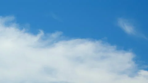 Cirrus or feather clouds against a blue sky. Natural beautiful scene. Purity and Stock Footage 208951201