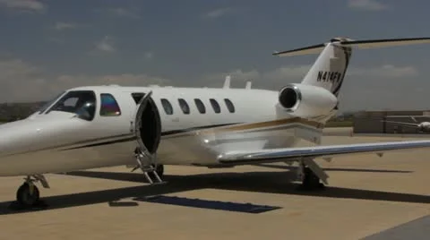 CITATION BUSINESS JET DOLLY IN Stock Footage