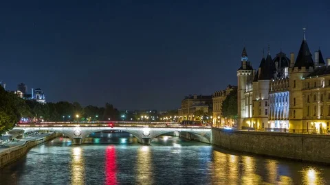 Cite island view with Conciergerie Castle and Pont au Change, over the Seine Stock Footage