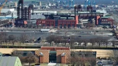 Aerial view of Philadelphia, Pennsylvania, with a focus on two of the city  professional sports venues: Citizens Bank Park, home of the baseball  Philadelphia Phillies (foreground); and the football Philadelphia Eagles'  Lincoln